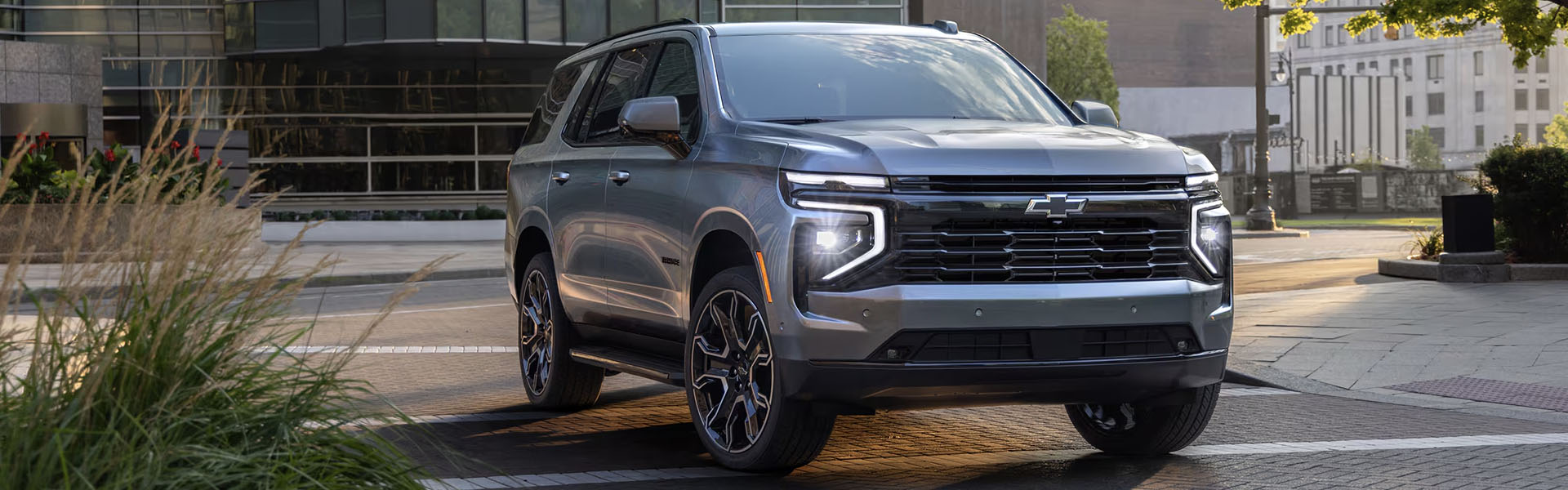 2025 Chevrolet Tahoe is parked in front of building