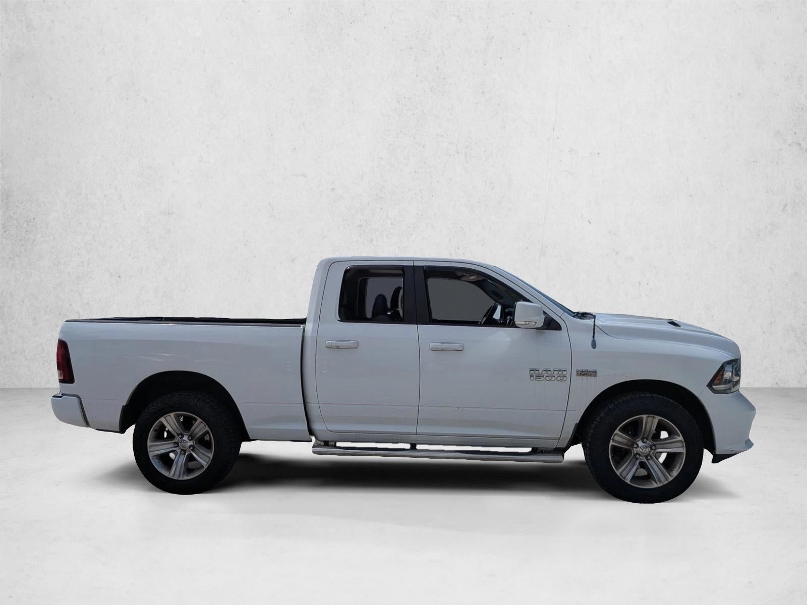 2013 RAM 1500 4WD Quad Cab 6.4 Ft Box Sport