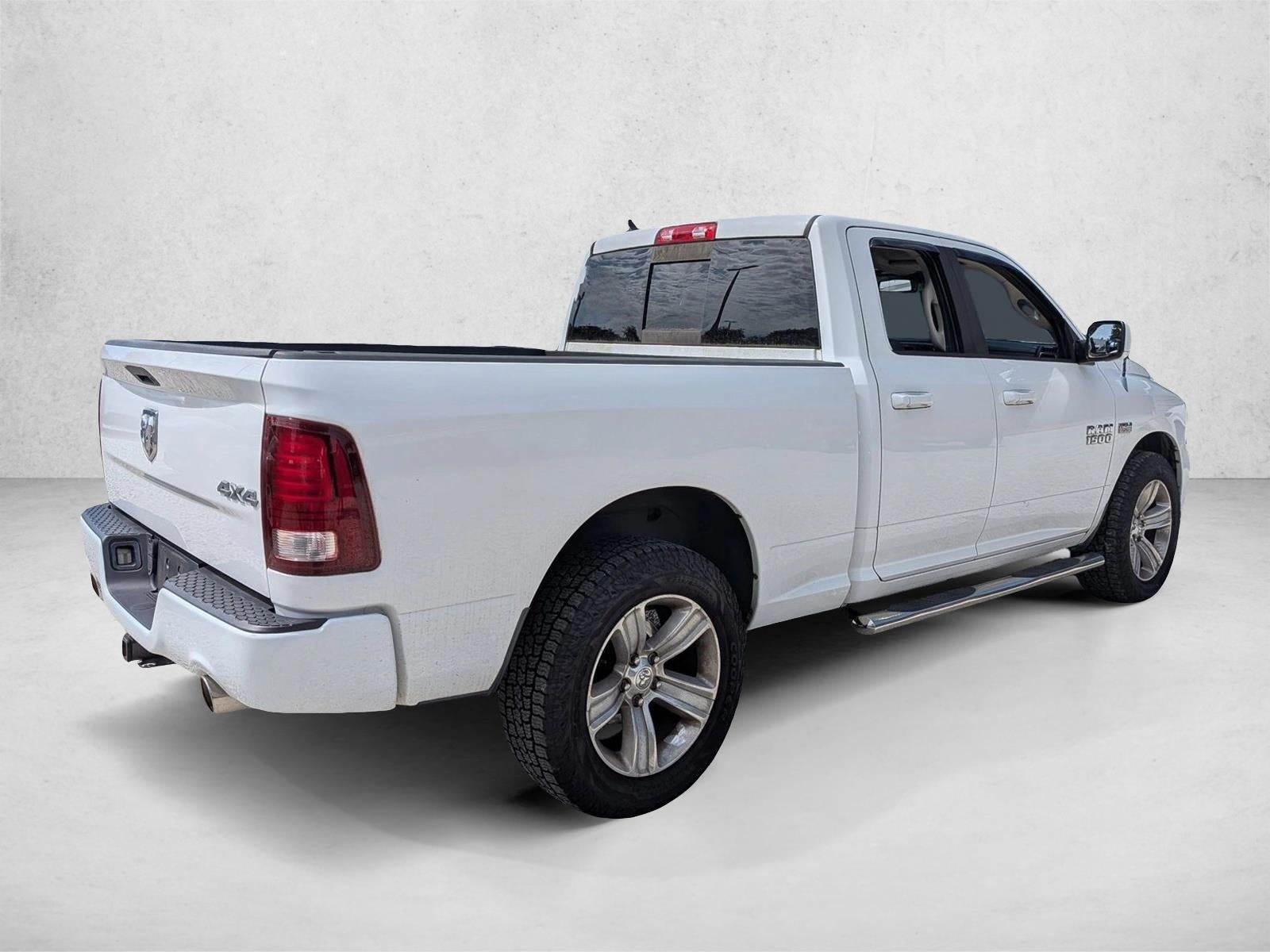 2013 RAM 1500 4WD Quad Cab 6.4 Ft Box Sport